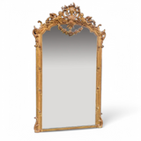 Large decorative antique over mantle mirror.