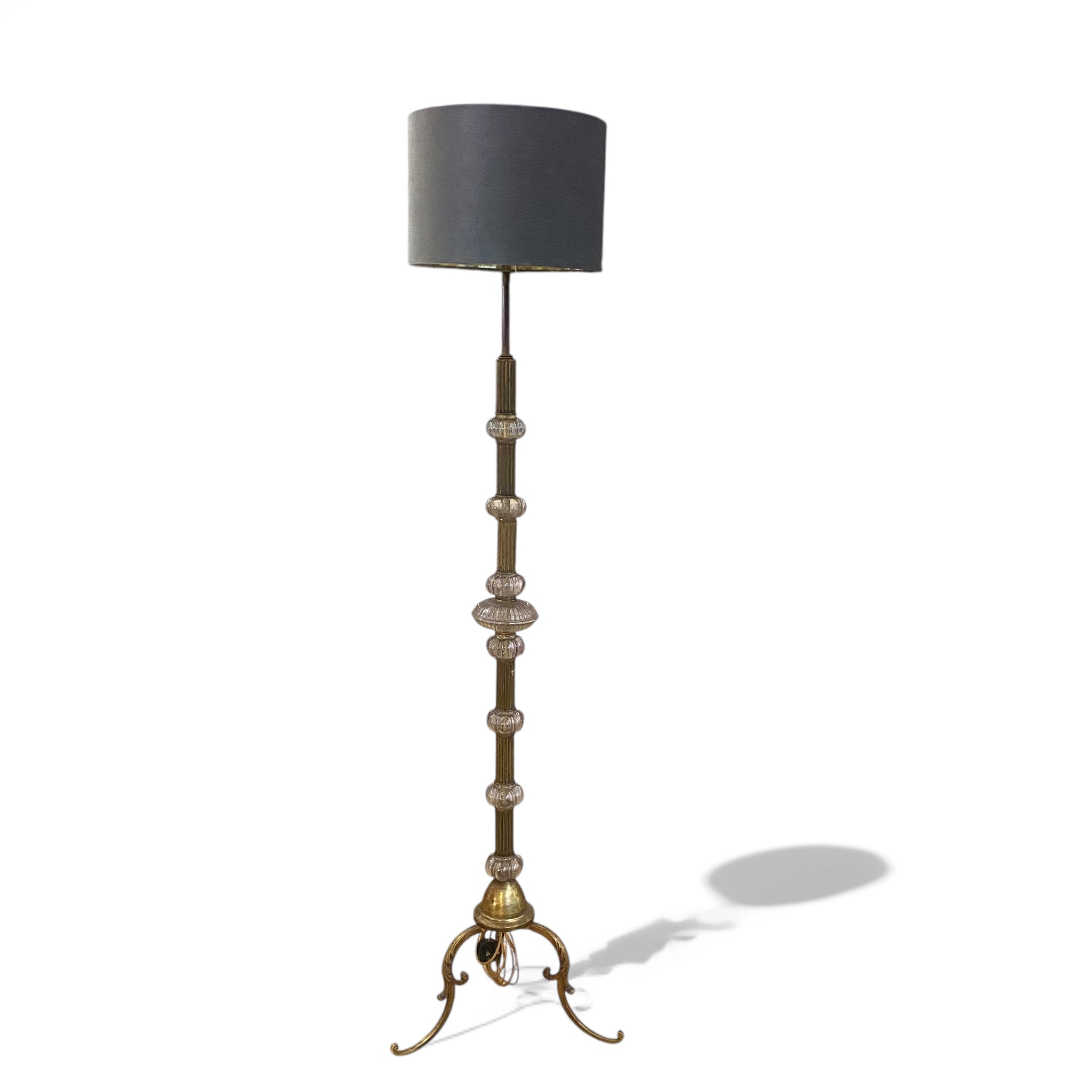 Antique French brass and glass floor lamp .