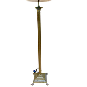 English antique brass floor lamp on lions paw feet.