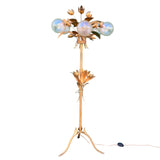 Stunning Gold floor lamp in the manner of Hans Khoghl .