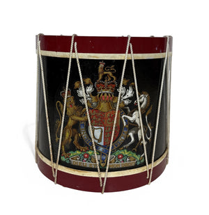 Side table in the form of a drum with the crest of the Monarch of the united kingdom.