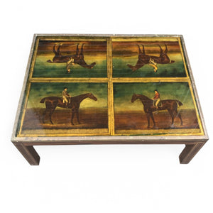 Extremely unusual campaign style coffee table with racehorses and  jockeys.