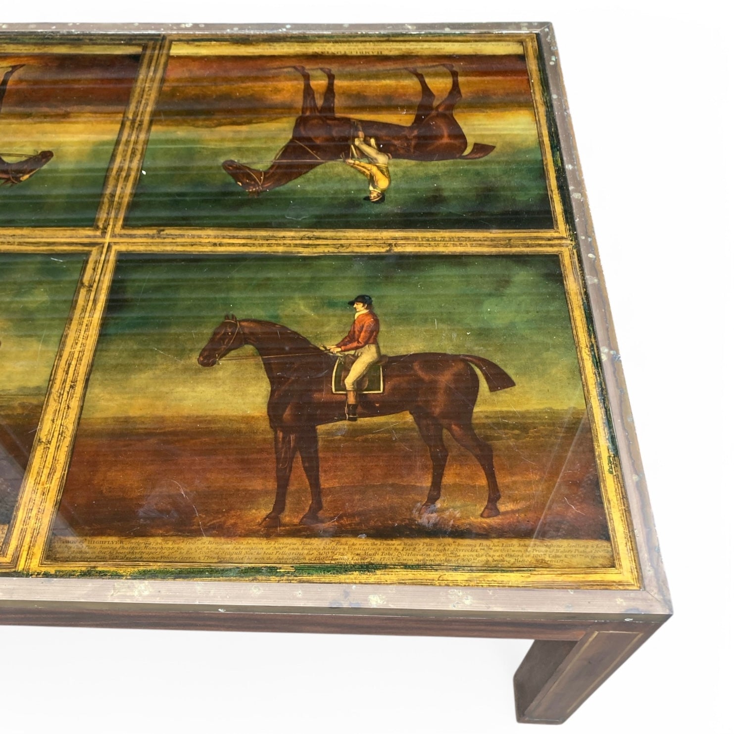 Extremely unusual campaign style coffee table with racehorses and  jockeys.