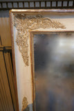 Classical parcel gilt french mirror with original glass circa 1900.