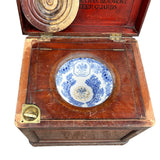 Officer's campaign latrine with Mahogany case and blue and white pottery bowl .